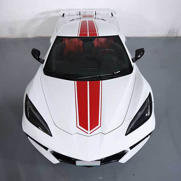 White Corvette with red center stripes and narrow accent borders