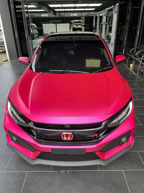 Pink Honda Civic with contrasting dark roof and front trim