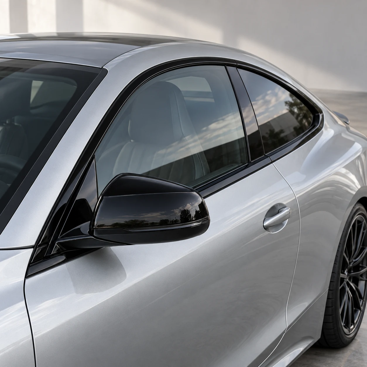 Illustration of gloss black window trim against the car body
